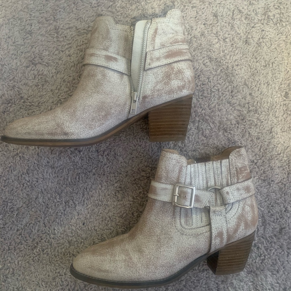 White washed booties with side buckle and zip